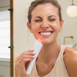 ReVive Glō Wrinkle Treatment light therapy wand. Brand new in box!